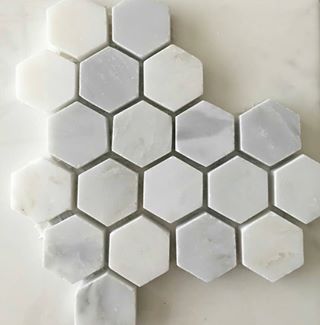 Small hexagon marble tiles. A very popular trend that we are adoring!